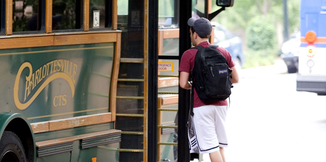 A student boards the trolley