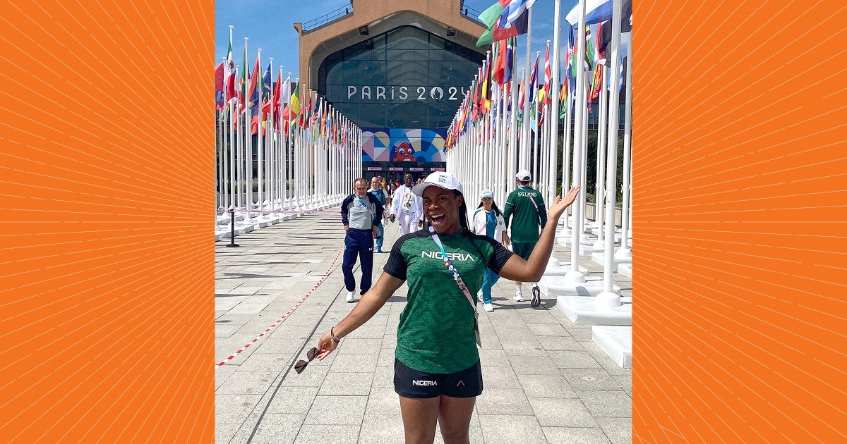 Anumba in front of the dining hall and Hall of Flags
