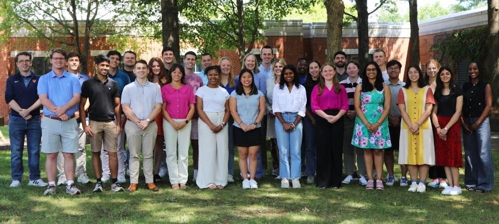 Community Fellows stand with Dean Leslie Kendrick