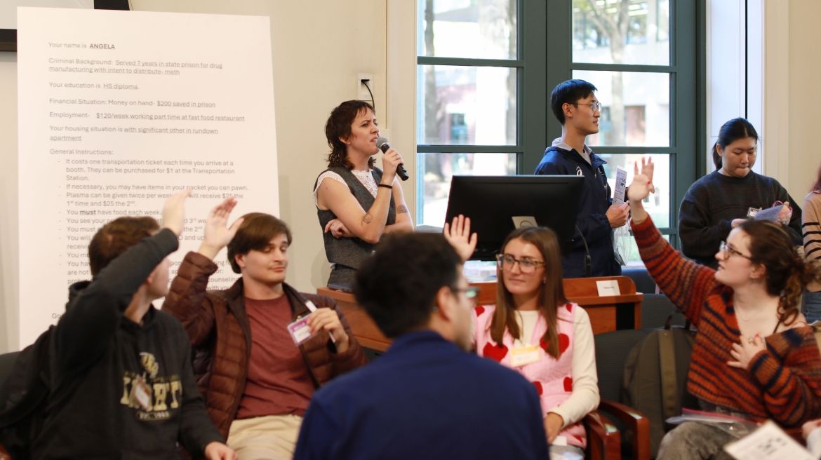 Professor Kelly Orians leads a simulation.