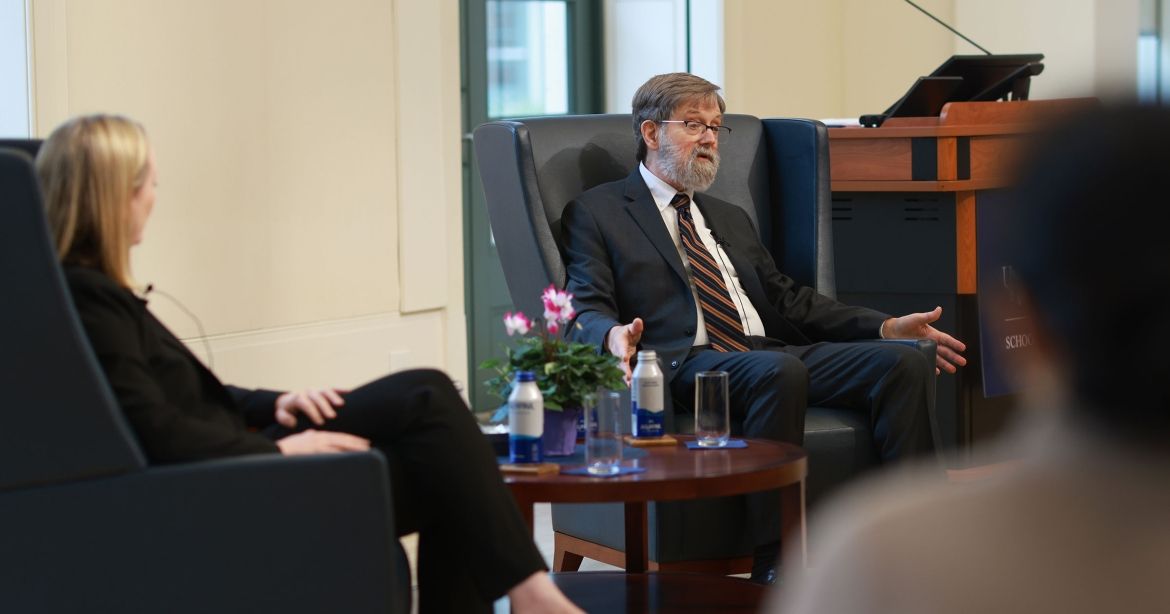 U.S. Deputy Solicitor General Edwin Kneedler sits with Dean Leslie Kendrick