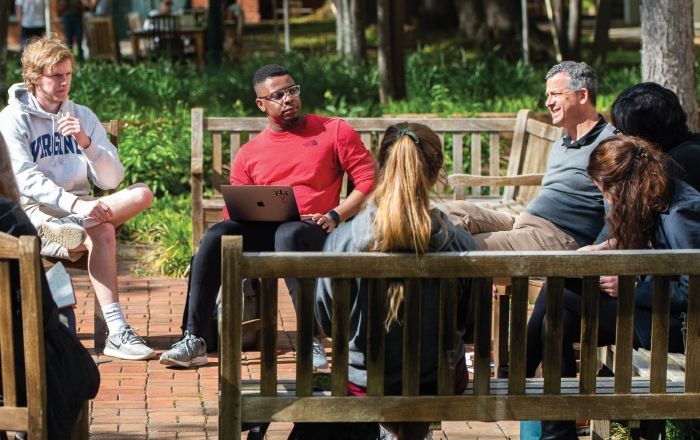 Professor Richard Schragger leads a class outside.