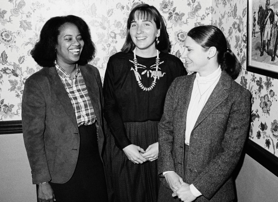 Mildred Ravenell (now Robinson), left, and Julie Roin, right, with an unidentified student