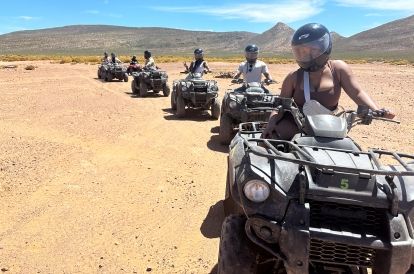 Students riding ATVs