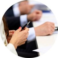 Lawyers hold a pen at a desk