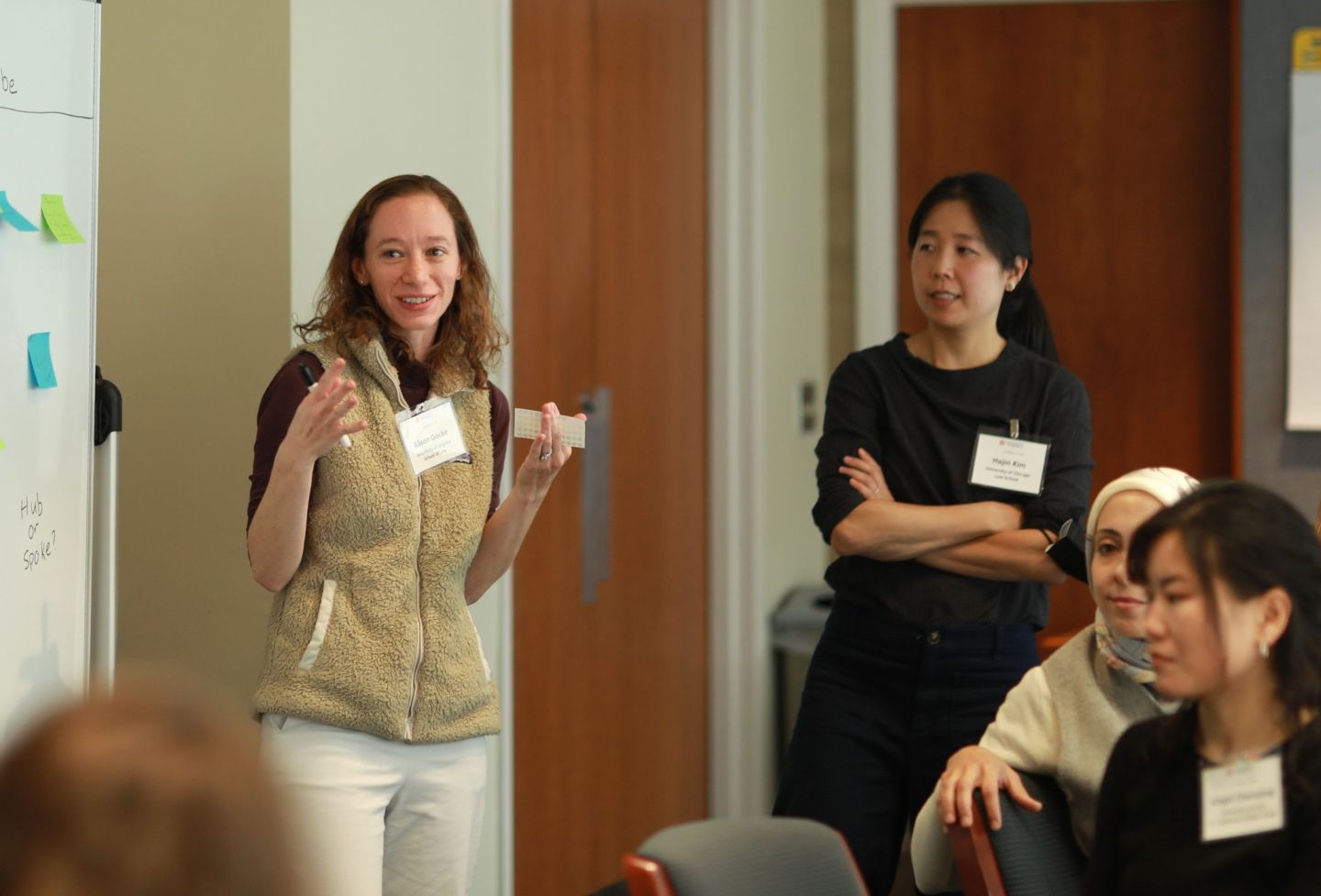 Professor Alison Gocke talks with conference attendees