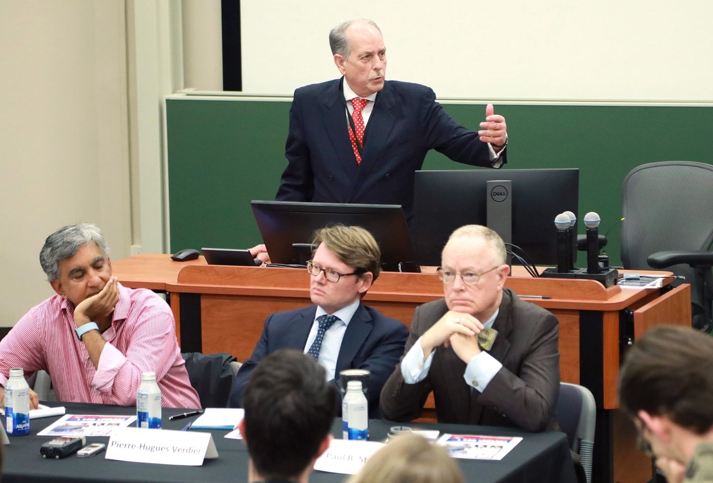 Lee Buchheit (standing), Mitu Gulati, Pierre Hugues-Verdier, Paul B. Stephan
