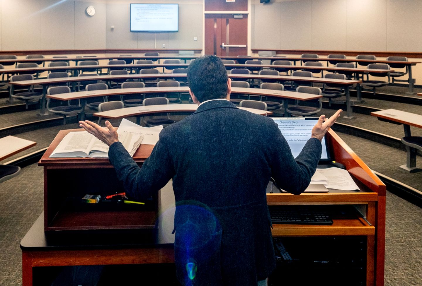 Professor at lectern