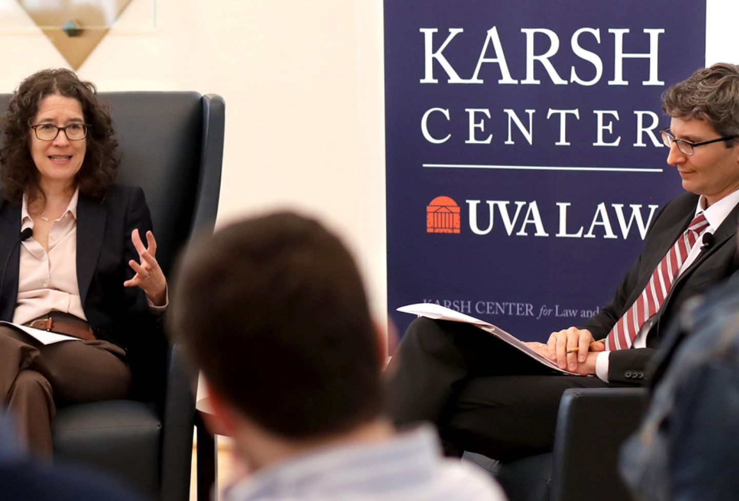Faculty discussed the legal implications of the impeachment inquiry in a three-part series hosted by the Karsh Center for Law and Democracy. Professors Deborah Hellman and Michael Gilbert, pictured, also are among a team of UVA scholars fighting to make CLEAR how corruption hurts democracies. 