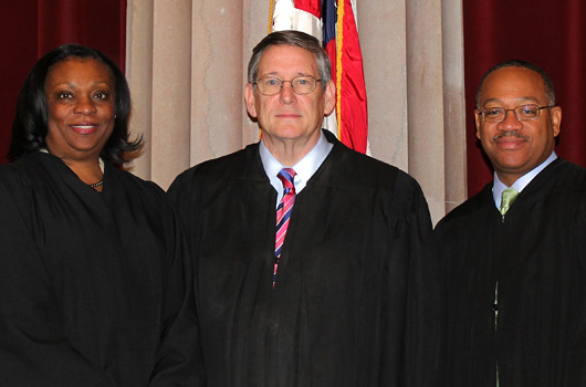 UVA Law alumni of the Supreme Court of Virginia, from left, Justice Cleo Powell ’82, Chief Justice Donald Lemons ’76, and Justice Bernard Goodwyn ’86
