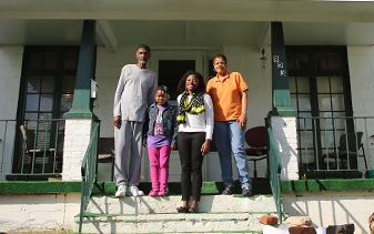 UVA Law clinic student with clients and their family members