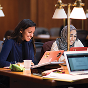 Monica Grover and Hamna Ahmad study in the Arthur J. Morris Law Library