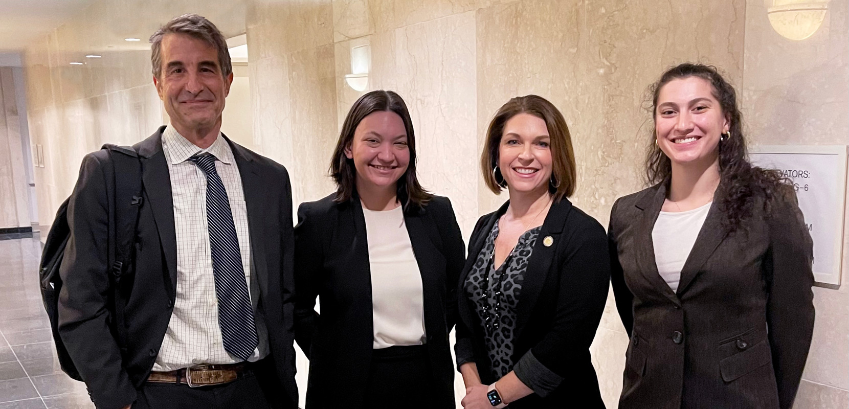 Professor Andrew Block, Erin Camia '22, Del. Carrie Coyner and Antonella Nicholas '23