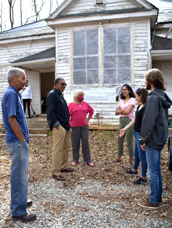 Clinic students at schoolhouse