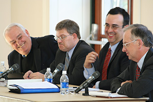 (L to R) Kevin Rooney, former director of the Executive Office of Immigration Review; David L. Neal, Chief Immigration Judge; Juan P. Osuna, acting chairman of the Board of Immigration Appeals; and moderator, Professor David Martin. 