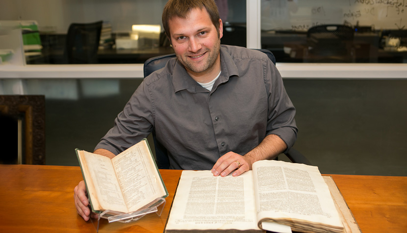 Digital Collections Librarian Loren Moulds shows books from the catalogue, and the catalogue itself.